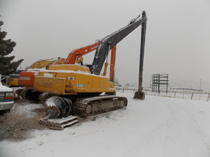 Long and short reach excavators and contruction equipment