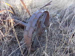 25 year collection of antique  steel farm equipment wheels