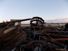 Load image into Gallery viewer, 25 year collection of antique  steel farm equipment wheels